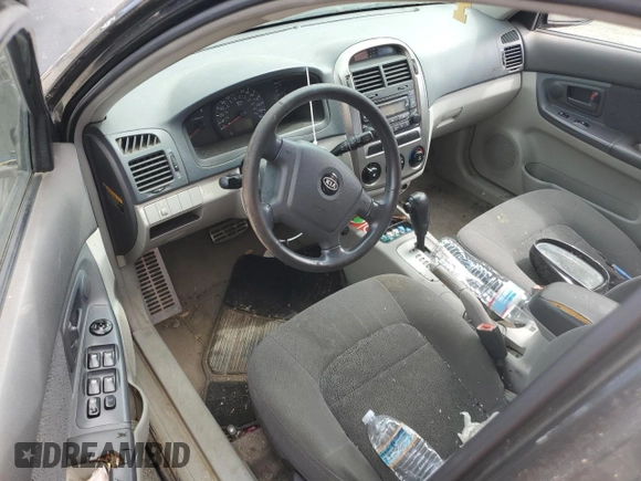 2005 Kia Spectra with VIN KNAFE162655074198, listed as a Copart auction lot 71015104 with 200,819 mi miles and Salvage Title. Bid and sale history available at DreamBid. Image 8.