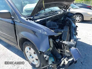 2010 Dodge Grand Caravan SE with VIN 2D4RN4DE9AR207728, listed as a IAAI auction lot 42132870 with 145,807 mi miles and . Bid and sale history available at DreamBid. Image 13.