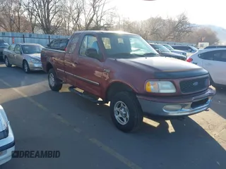 1997 Ford F-150 XL with VIN 1FTDX1869VKA51231, listed as a IAAI auction lot 41846817 with 297,327 mi miles. Bid and sale history available at carsss.com. Image 1.