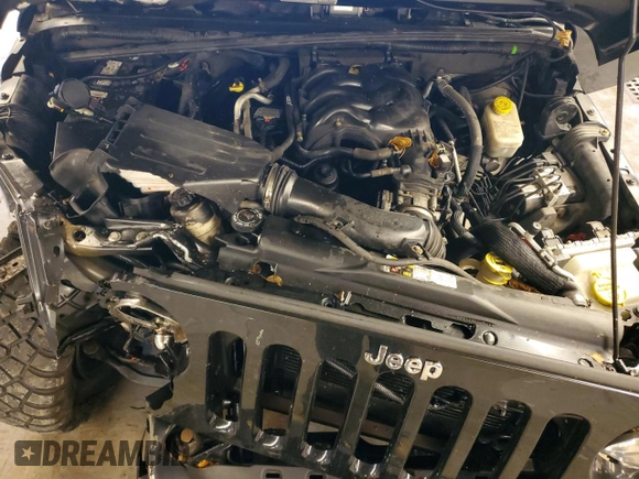 2013 Jeep Wrangler Rubicon with VIN 1C4HJWCG6DL666540, listed as a Copart auction lot 79337404 with 130,448 mi miles and Salvage title. Bid and sale history available at DreamBid. Image 11.