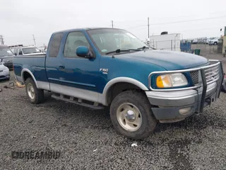 2000 Ford F-150 XL z VIN 1FTRX18L9YNA92067, wystawiony jako IAAI lot #41894531 z przebiegiem Nie podano mil oraz . Historia ofert i sprzedaży dostępna na DreamBid. Obrazek 1.