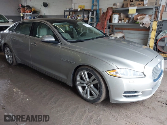 2013 Jaguar XJ Portfolio with VIN SAJWJ2GD0D8V50948, listed as a IAAI auction lot 42067884 with 110,053 mi miles and . Bid and sale history available at DreamBid. Image 1.