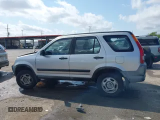 2003 Honda CR-V LX z VIN JHLRD68493C008030, wystawiony jako IAAI lot #42034191 z przebiegiem 290 596 mil mil oraz . Historia ofert i sprzedaży dostępna na DreamBid. Obrazek 14.