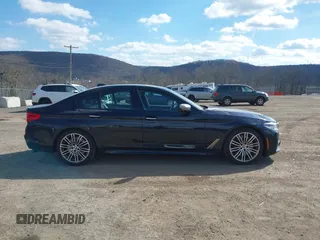 2018 BMW 5 Series M550i xDrive with VIN WBAJB9C52JB035930, listed as a IAAI auction lot 41674415 with 56,294 mi miles and . Bid and sale history available at DreamBid. Image 13.