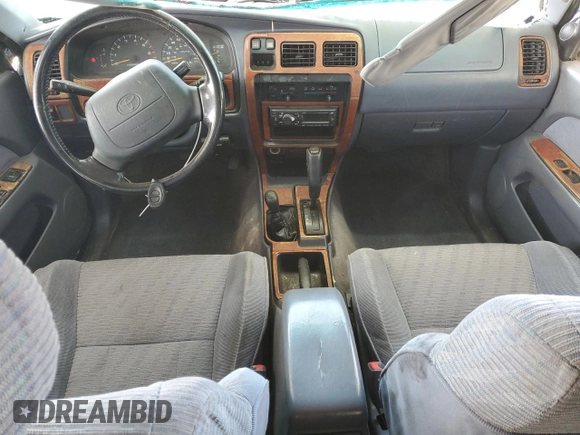 1997 Toyota 4Runner SR5 z VIN JT3HN86R4V0109713, wystawiony jako Copart lot #52540845 z przebiegiem 330 787 mil mil oraz Szkoda całkowita • Salvage title. Historia ofert i sprzedaży dostępna na DreamBid. Obrazek 8.