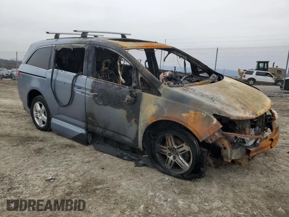 2012 Honda Odyssey Touring with VIN 5FNRL5H92CB127191, listed as a Copart auction lot 44720295 with Not Provided miles and Salvage Title. Bid and sale history available at DreamBid. Image 4.