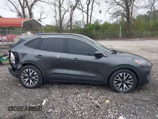 2020 Ford Escape SE Sport Hybrid with VIN 1FMCU0BZ7LUB13398, listed as a IAAI auction lot 41942498 with 118,604 mi miles and . Bid and sale history available at DreamBid. Image 14.