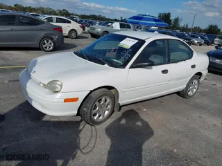 1999 Dodge Neon Highline with VIN 3B3ES47CXXT200471, listed as a IAAI auction lot 41282708 with 109,658 mi miles. Bid and sale history available at carsss.com. Image 2.