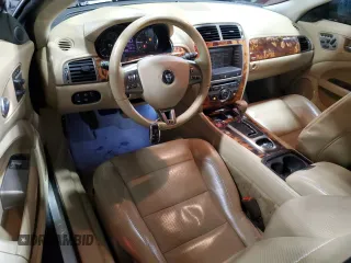 2007 Jaguar XK with VIN SAJWA43C479B18700, listed as a Copart auction lot 83377684 with 143,746 mi miles and Salvage Title. Bid and sale history available at carsss.com. Image 8.