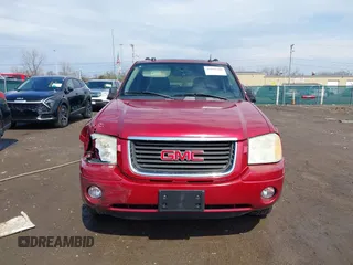 2005 GMC Envoy SLE with VIN 1GKDT13S252127604, listed as a IAAI auction lot 41898390 with 210,655 mi miles. Bid and sale history available at carsss.com. Image 12.