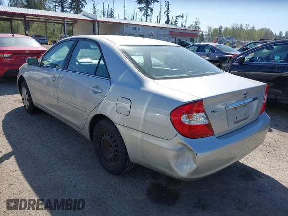 2004 Toyota Camry LE with VIN 4T1BE32K74U350908, listed as a IAAI auction lot 42099989 with 120,971 mi miles. Bid and sale history available at carsss.com. Image 3.