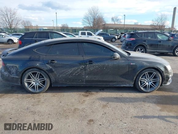 2014 Audi A7 3.0 Prestige with VIN WAU2GAFC6EN030266, listed as a IAAI auction lot 41439486 with 160,917 mi miles. Bid and sale history available at carsss.com. Image 13.