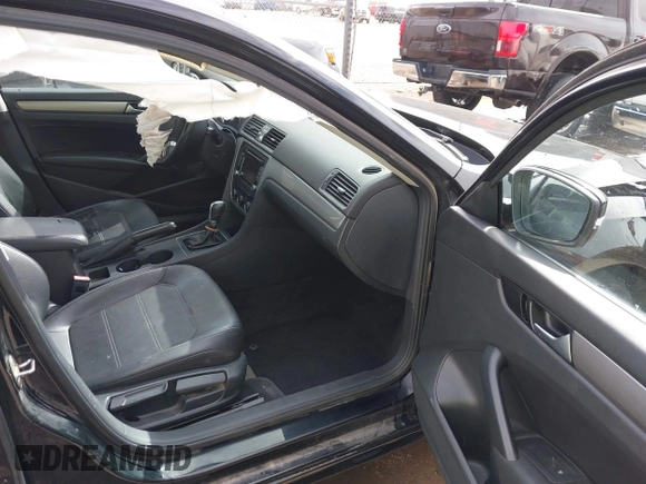 2015 Volkswagen Passat 1.8T Limited Edition with VIN 1VWAT7A31FC111352, listed as a IAAI auction lot 41575307 with 130,080 mi miles. Bid and sale history available at carsss.com. Image 5.
