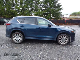 2023 Mazda CX-5 Signature with VIN JM3KFBXY4P0153335, listed as a IAAI auction lot 40053867 with 17,828 mi miles and . Bid and sale history available at carsss.com. Image 13.