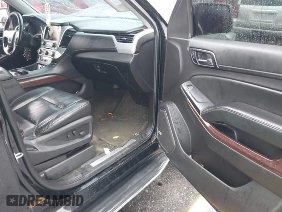 2016 GMC Yukon SLT with VIN 1GKS1BKC8GR217962, listed as a IAAI auction lot 40422726 with 182,293 mi miles. Bid and sale history available at carsss.com. Image 5.