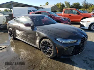 2023 BMW M4 Competition xDrive with VIN WBS43AZ05PCL63204, listed as a Copart auction lot 64324373 with 7,700 mi miles. Bid and sale history available at carsss.com. Image 4.