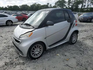 2014 Smart fortwo Pure with VIN WMEEJ3BA7EK761731, listed as a Copart auction lot 60268205 with 61,973 mi miles and Salvage title. Bid and sale history available at DreamBid. Image 1.