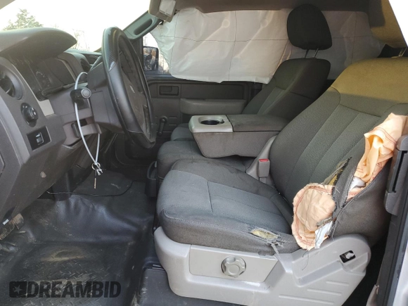 2009 Ford F-150 STX with VIN 1FTRX12879KB52256, listed as a Copart auction lot 44255075 with 211,613 mi miles and Salvage Title. Bid and sale history available at carsss.com. Image 7.