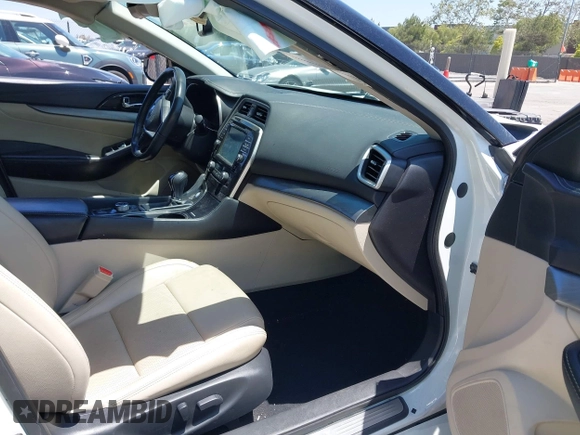 2016 Nissan Maxima SV with VIN 1N4AA6AP6GC903638, listed as a IAAI auction lot 42180421 with 124,586 mi miles and . Bid and sale history available at DreamBid. Image 5.