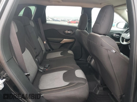 2017 Jeep Cherokee Sport z VIN 1C4PJLAS9HW573906, wystawiony jako Copart lot #87459584 z przebiegiem 73 501 mil mil oraz Szkoda całkowita • Salvage title. Historia ofert i sprzedaży dostępna na DreamBid. Obrazek 11.