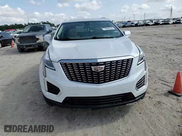 2021 Cadillac XT5 FWD Premium Luxury z VIN 1GYKNCR48MZ136597, wystawiony jako Copart lot #79694104 z przebiegiem 52 504 mil mil oraz Szkoda całkowita • Salvage title. Historia ofert i sprzedaży dostępna na DreamBid. Obrazek 12.