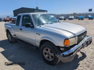 2003 Ford Ranger XL Fleet with VIN 1FTZR45E93PB55618, listed as a Copart auction lot 58780015 with 82,839 mi miles and Salvage title. Bid and sale history available at DreamBid. Image 4.