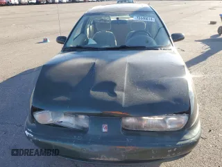 1996 Saturn SL with VIN 1G8ZK5272TZ137198, listed as a Copart auction lot 72446614 with 99,586 mi miles and Salvage title. Bid and sale history available at DreamBid. Image 5.