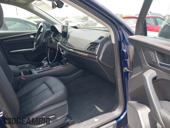 2021 Audi Q5 Premium with VIN WA1AAAFY7M2004975, listed as a IAAI auction lot 42190283 with 56,810 mi miles and . Bid and sale history available at DreamBid. Image 5.