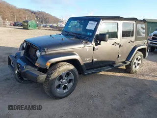2017 Jeep Wrangler Unlimited Sahara with VIN 1C4BJWEG9HL507908, listed as a IAAI auction lot 41880209 with 99,773 mi miles. Bid and sale history available at carsss.com. Image 17.