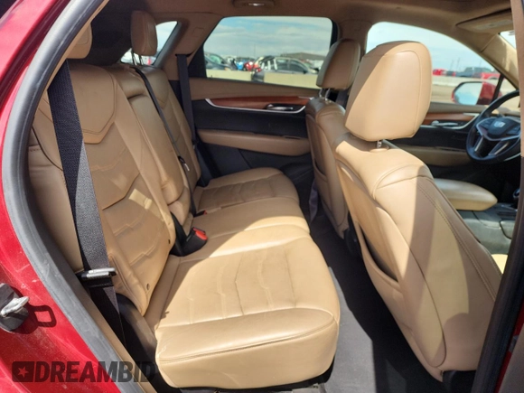 2017 Cadillac XT5 Platinum AWD z VIN 1GYKNFRS0HZ282045, wystawiony jako Copart lot #51217625 z przebiegiem 161 567 mil mil oraz Szkoda całkowita • Salvage title. Historia ofert i sprzedaży dostępna na DreamBid. Obrazek 11.