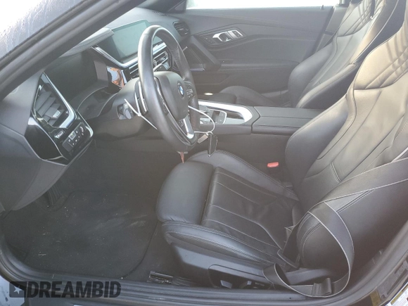 2020 BMW Z4 sDrive30i with VIN WBAHF3C03LWW64905, listed as a Copart auction lot 77010554 with 27,612 mi miles and Salvage Title. Bid and sale history available at carsss.com. Image 7.