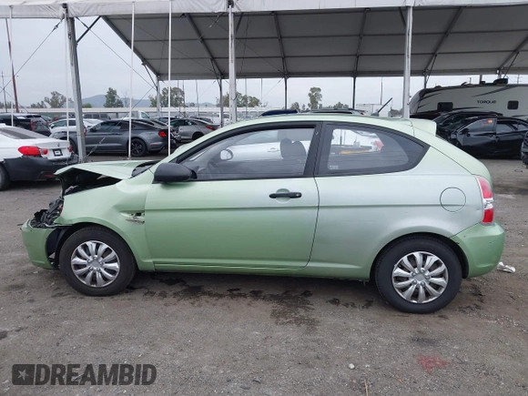 2008 Hyundai Accent GS with VIN KMHCM36C48U073067, listed as a IAAI auction lot 42055217 with 173,949 mi miles. Bid and sale history available at carsss.com. Image 14.