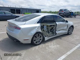 2015 Lincoln MKZ z VIN 3LN6L2GK5FR622117, wystawiony jako IAAI lot #42164455 z przebiegiem 167 156 mil mil oraz . Historia ofert i sprzedaży dostępna na DreamBid. Obrazek 4.