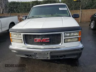 1999 GMC Yukon with VIN 1GKEK13RXXJ735870, listed as a Copart auction lot 44988505 with 150,557 mi miles and Salvage Title. Bid and sale history available at carsss.com. Image 5.