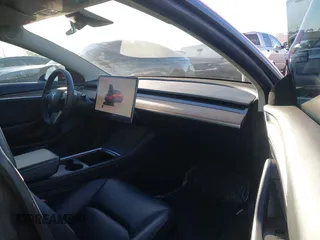 2022 Tesla Model 3 with VIN 5YJ3E1EA1NF288903, listed as a IAAI auction lot 41610215 with 96,050 mi miles and . Bid and sale history available at DreamBid. Image 5.