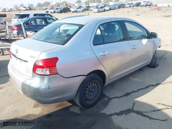 2010 Toyota Yaris with VIN JTDBT4K37A4076727, listed as a IAAI auction lot 41023533 with 102,494 mi miles. Bid and sale history available at carsss.com. Image 4.