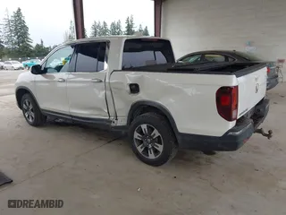 2017 Honda Ridgeline RTL-E with VIN 5FPYK3F7XHB030551, listed as a IAAI auction lot 41903844 with 153,594 mi miles. Bid and sale history available at carsss.com. Image 3.