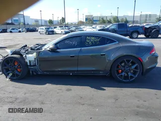 2018 Karma Revero z VIN 50GK41SA4JA000249, wystawiony jako IAAI lot #41865477 z przebiegiem 104 010 mil mil oraz . Historia ofert i sprzedaży dostępna na DreamBid. Obrazek 14.