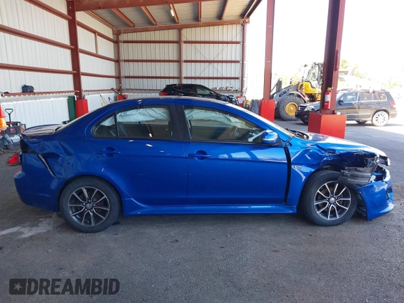 2017 Mitsubishi Lancer ES with VIN JA32V2FW5HU004856, listed as a IAAI auction lot 41950912 with 74,890 mi miles. Bid and sale history available at carsss.com. Image 13.