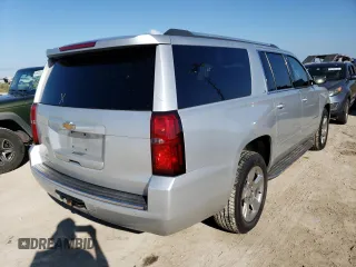 2016 Chevrolet Suburban LTZ with VIN 1GNSKJKC2GR433297, listed as a Copart auction lot 65443682 with Not Provided miles and . Bid and sale history available at DreamBid. Image 4.