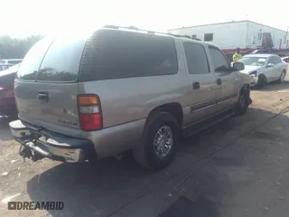 2003 Chevrolet Suburban LT with VIN 1GNEC16Z43J254339, listed as a IAAI auction lot 39240820 with 180,945 mi miles. Bid and sale history available at carsss.com. Image 4.