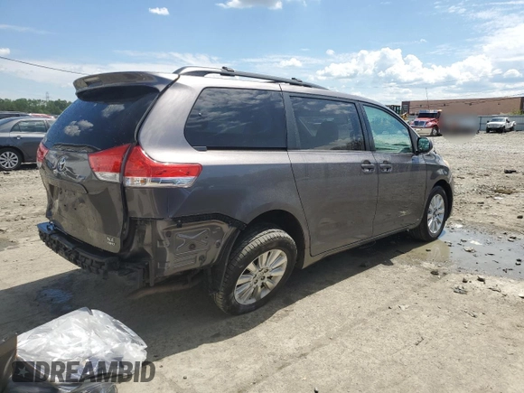 2014 Toyota Sienna Limited with VIN 5TDDK3DC5ES083477, listed as a Copart auction lot 56127375 with 131,560 mi miles and Salvage title. Bid and sale history available at DreamBid. Image 3.