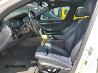 2018 BMW 5 Series 530e with VIN WBAJA9C55JG623083, listed as a Copart auction lot 55872524 with 90,222 mi miles and Non repairable. Bid and sale history available at DreamBid. Image 7.