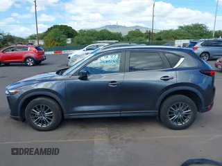2021 Mazda CX-5 Touring with VIN JM3KFACM2M1348305, listed as a IAAI auction lot 41627199 with 30,044 mi miles. Bid and sale history available at carsss.com. Image 15.