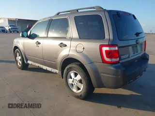 2011 Ford Escape XLT with VIN 1FMCU0D70BKA27369, listed as a IAAI auction lot 40970437 with 119,719 mi miles. Bid and sale history available at carsss.com. Image 3.