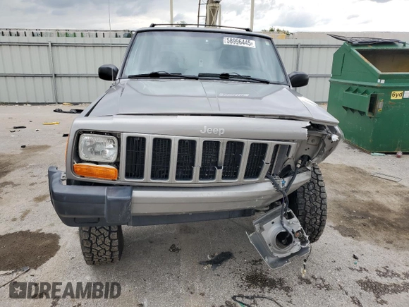 2001 Jeep Cherokee Sport with VIN 1J4FF48S91L592966, listed as a Copart auction lot 58996445 with 159,140 mi miles and Salvage title. Bid and sale history available at DreamBid. Image 5.