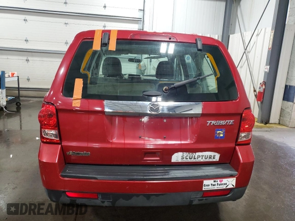 2011 Mazda Tribute Touring with VIN 4F2CY0C71BKM06780, listed as a Copart auction lot 77748114 with 144,163 mi miles and Salvage Title. Bid and sale history available at carsss.com. Image 6.