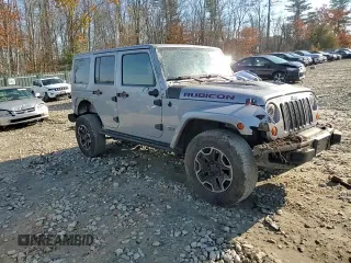 2013 Jeep Wrangler Unlimited Rubicon 10th Anniversary z VIN 1C4HJWFG3DL692993, wystawiony jako Copart lot #78599224 z przebiegiem 135 942 mil mil oraz Szkoda całkowita • Salvage title. Historia ofert i sprzedaży dostępna na DreamBid. Obrazek 11.