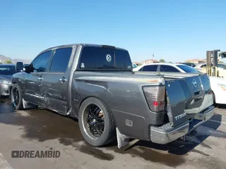 2004 Nissan Titan LE with VIN 1N6AA07A14N541998, listed as a IAAI auction lot 42304039 with 189,533 mi miles and . Bid and sale history available at DreamBid. Image 6.