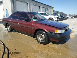 1989 Toyota Camry DLX z VIN 4T1SV21E3KU053153, wystawiony jako Copart lot #49917485 z przebiegiem 79 028 mil mil oraz Szkoda całkowita • Salvage title. Historia ofert i sprzedaży dostępna na DreamBid. Obrazek 4.